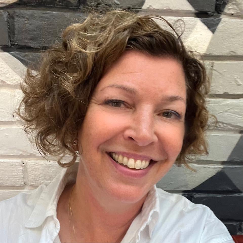 Stacey Simpson, Reiki master and astrologer